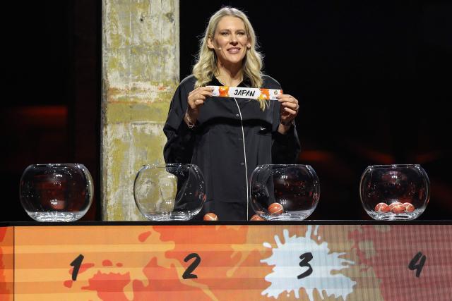 Lauren Jackson, Australian former basketball player, draws Japan out of the pot to go in to Group A during the FIBA Women's Basketball 2026 World Cup draw in Berlin on April 21, 2026. (Photo by Odd ANDERSEN / AFP)