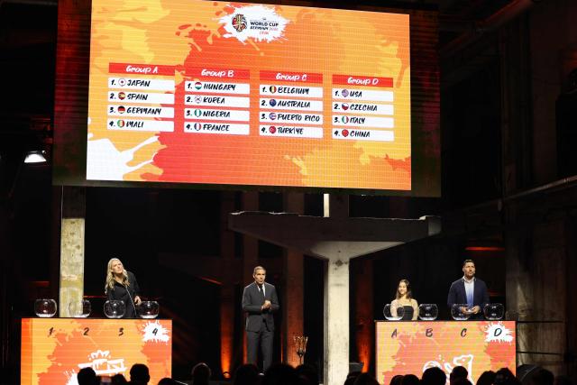 The results of the FIBA Women's Basketball 2026 World Cup draw are seen on the display after the names were drawn by Lauren Jackson (L), Australian former basketball player, German handball player Stefan Kretzschmar (R) and German breakdancer Bgirl Jilou (2nd R) at a ceremony in Berlin on April 21, 2026. (Photo by Odd ANDERSEN / AFP)