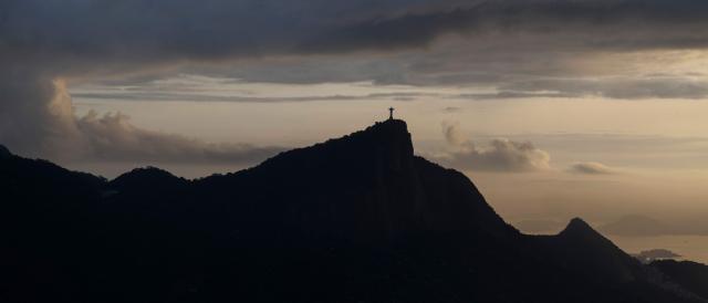 General view of the Christ the Redeemer statue on Corcovado mountain in the Tijuca Forest National Park, in Rio de Janeiro, Brazil on April 21, 2026. (Photo by Pablo PORCIUNCULA / AFP)