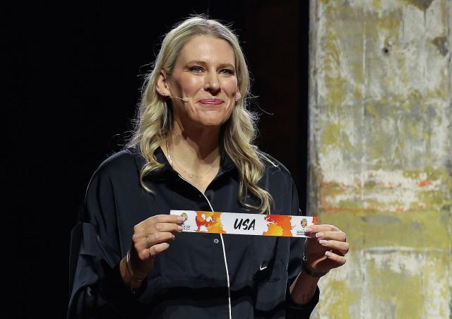Lauren Jackson, Australian former basketball player, draws USA out of the pot to go in to Group D during the FIBA Women's Basketball 2026 World Cup draw in Berlin on April 21, 2026. (Photo by Odd ANDERSEN / AFP) / ALTERNATIVE CROP