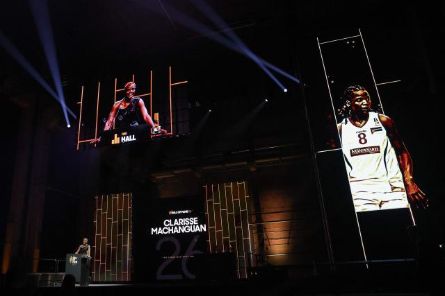 Mozambique basketball player Clarisse Machanguana speaks after receiving her award at the International Basketball Federation FIBA Hall of Fame 2026 Induction ceremony in Berlin on April 21, 2026. (Photo by Odd ANDERSEN / AFP)