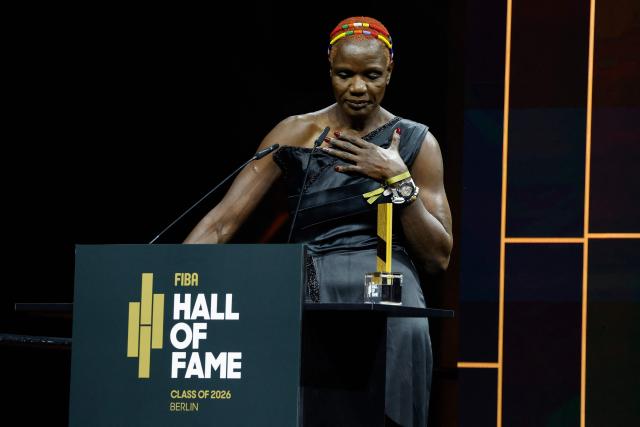 Mozambique basketball player Clarisse Machanguana speaks after receiving her award at the International Basketball Federation FIBA Hall of Fame 2026 Induction ceremony in Berlin on April 21, 2026. (Photo by Odd ANDERSEN / AFP)