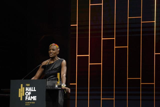 Mozambique basketball player Clarisse Machanguana speaks after receiving her award at the International Basketball Federation FIBA Hall of Fame 2026 Induction ceremony in Berlin on April 21, 2026. (Photo by Odd ANDERSEN / AFP)