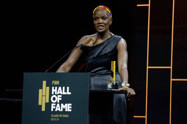 Mozambique basketball player Clarisse Machanguana speaks after receiving her award at the International Basketball Federation FIBA Hall of Fame 2026 Induction ceremony in Berlin on April 21, 2026. (Photo by Odd ANDERSEN / AFP)