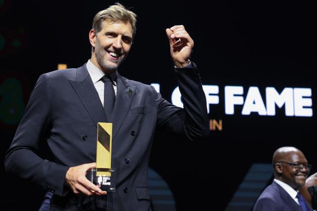 German former basketball player Dirk Nowitzki poses with his award at the International Basketball Federation FIBA Hall of Fame 2026 Induction ceremony in Berlin on April 21, 2026. (Photo by Odd ANDERSEN / AFP)