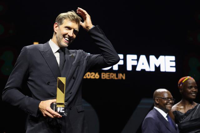 German former basketball player Dirk Nowitzki poses with his award at the International Basketball Federation FIBA Hall of Fame 2026 Induction ceremony in Berlin on April 21, 2026. (Photo by Odd ANDERSEN / AFP)