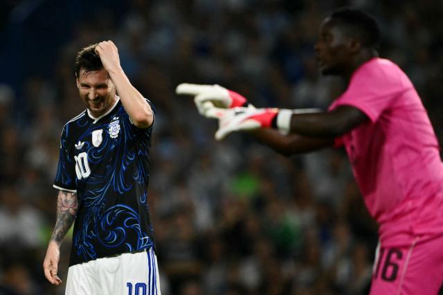(FILES) Argentina's forward #10 Lionel Messi gestures past Zambia's goalkeeper #16 Willard Mwanza during a friendly football match between Argentina and Zambia at La Bombonera stadium in Buenos Aires on March 31, 2026. US lawyer Ralph Patino, representing promoter VID Music Group, said on April 21, 2026 that star Lionel Messi is complicit with the Argentine Football Association (AFA) in a multimillion-dollar lawsuit over breach of contract. (Photo by Luis ROBAYO / AFP)