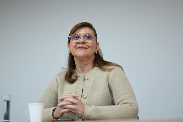 Agueda Plata, a delegate of the Colombian government, looks on during the presentation of the first report by the Tripartite Mechanism for Follow-up, Monitoring and Verification (MTSMV) of the Socio-Legal Dialogue Forum (ECSJ) between the Colombian government and Colombia’s self-proclaimed Gaitanist Army (EGC) at the offices of the Mission to Support the Peace Process in Colombia (MAPP) in Bogota on April 21, 2026. (Photo by Pablo VERA / AFP)