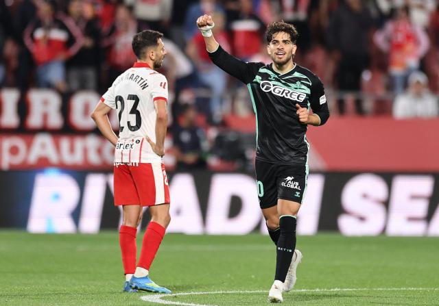 Real Betis' Moroccan forward #10 Abde Ezzalzouli celebrates scoring his team's second goal during the Spanish league football match between Girona FC and Real Betis at the Montilivi Stadium in Girona on April 21 , 2026. (Photo by Josep LAGO / AFP)