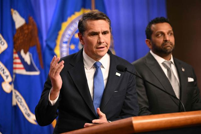 Acting US Attorney General Todd Blanche speaks during a press conference with FBI Director Kash Patel next to him, at the Department of Justice in Washington, DC, on April 21, 2026. The US Department of Justice announced April 21, that the Southern Poverty Law Center, a civil rights group that is known for tracking the activities of hate groups, is under investigation for secretly funneling funds to white supremacist groups. (Photo by Mandel NGAN / AFP)