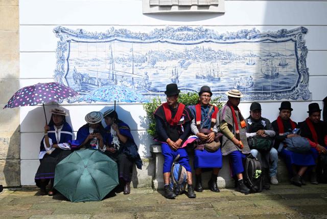 Misak Indigenous people protest to demand compliance with agreements reached with the government regarding their territories outside the Ministry of Foreign Affairs in Bogota on April 21, 2026. (Photo by Raul ARBOLEDA / AFP)