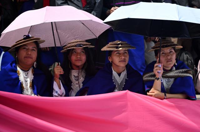 Misak Indigenous women protest to demand compliance with agreements reached with the government regarding their territories outside the Ministry of Foreign Affairs in Bogota on April 21, 2026. (Photo by Raul ARBOLEDA / AFP)
