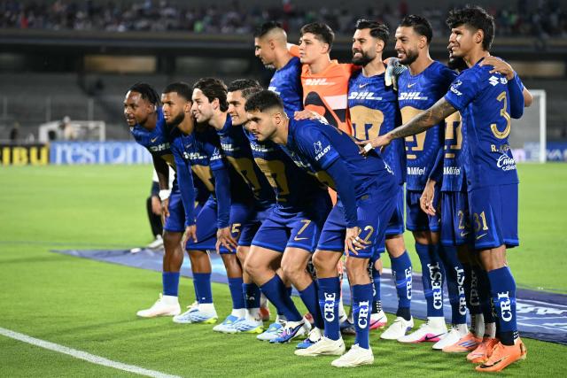 Pumas players pose for a team photo ahead of a Pumas vs Juarez Mexican League football match in Mexico City on April 21, 2026. (Photo by YURI CORTEZ / AFP)