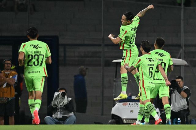 Juarez's defender #33 Francisco Nevarez celebrates with teammates after scoring during a Pumas vs Juarez Mexican League football match in Mexico City on April 21, 2026. (Photo by YURI CORTEZ / AFP)