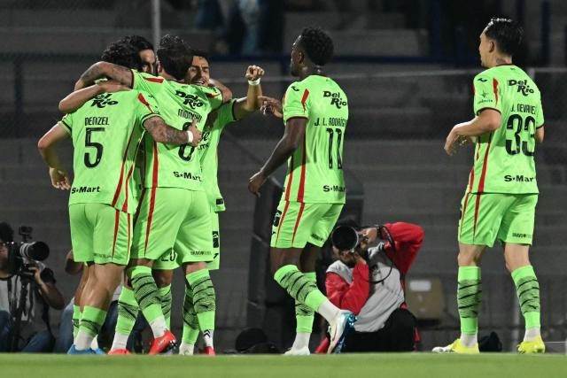 Juarez's forward #20 Jairo Torres (4th L) celebrates with teammates after scoring during a Pumas vs Juarez Mexican League football match in Mexico City on April 21, 2026. (Photo by YURI CORTEZ / AFP)