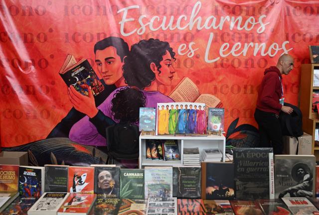 Books are on display at the International Book Fair in Bogota on April 21, 2026. (Photo by Raul ARBOLEDA / AFP)