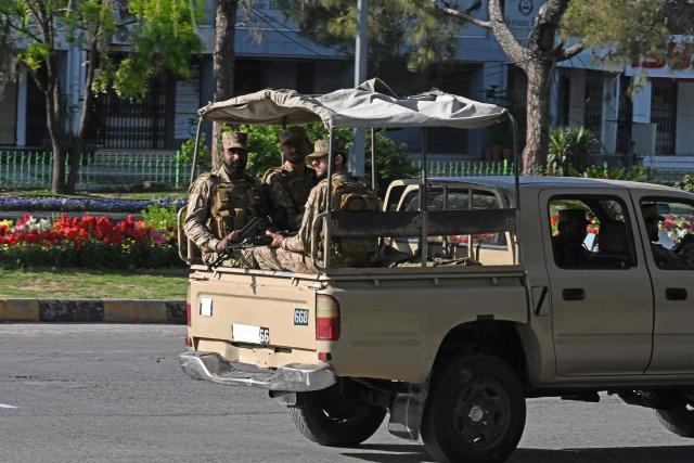 Army soldiers patrol on a street at the Red Zone area in Islamabad on April 22, 2026. Pakistani Prime Minister Shehbaz Sharif thanked US President Donald Trump on April 22, for extending a ceasefire with Iran that had been soon set to expire and urged both sides to continue talks. (Photo by Aamir QURESHI / AFP)