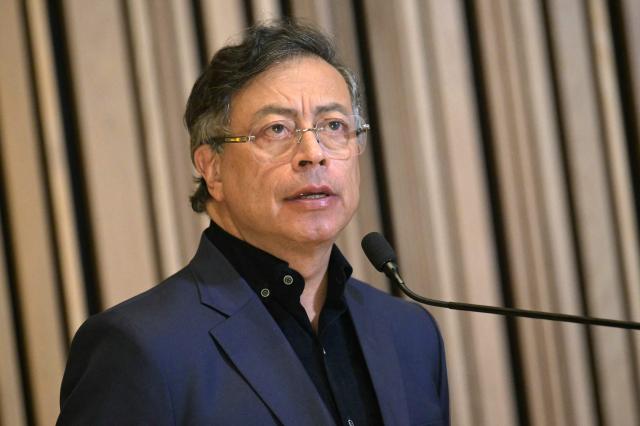 (FILES) Colombian President Gustavo Petro speaks during a meeting with members of the Colombian diaspora at the Martin Luther King Jr. Memorial Library in Washington, DC, on February 5, 2026. Colombian President Gustavo Petro ended on April 21, 2026, the peace negotiations with one of the country’s main guerrilla groups, led by ‘Calarca’, marking another setback for his peace policy ahead of his departure from office in August. (Photo by Oliver Contreras / AFP)