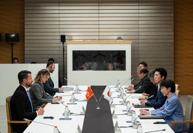 Japan's Prime Minister Sanae Takaichi (R) meets with Montenegro's President Jakov Milatovic (L) at the prime minister's office in Tokyo on April 22, 2026. (Photo by Andrew CABALLERO-REYNOLDS / AFP)