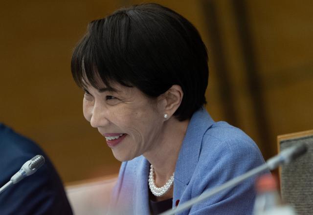Japan's Prime Minister Sanae Takaichi smiles as she meets with Montenegro's President Jakov Milatovic during a meeting at the prime minister's office in Tokyo on April 22, 2026. (Photo by Andrew CABALLERO-REYNOLDS / AFP)