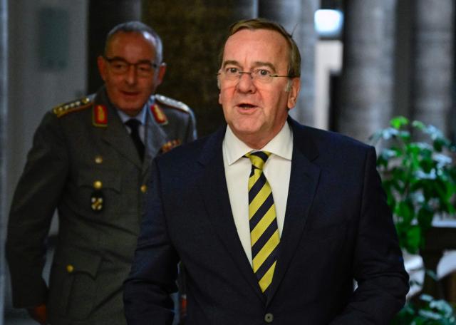 German Defence Minister Boris Pistorius and the General Inspector of the German armed forces Carsten Breuer arrive to give a press conference on the status of the German armed forces Bundeswehr, on April 22, 2026 at the Defence ministry in Berlin. (Photo by Tobias SCHWARZ / AFP)
