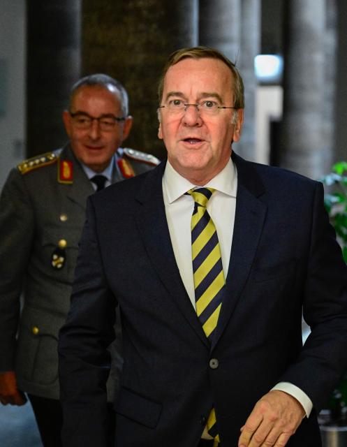 German Defence Minister Boris Pistorius and the General Inspector of the German armed forces Carsten Breuer arrive to give a press conference on the status of the German armed forces Bundeswehr, on April 22, 2026 at the Defence ministry in Berlin. (Photo by Tobias SCHWARZ / AFP)