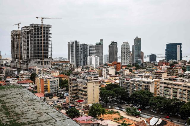 A general view of the construction on high-rise buildings in the capital of Luanda on April 21, 2026. (Photo by Phill Magakoe / AFP)