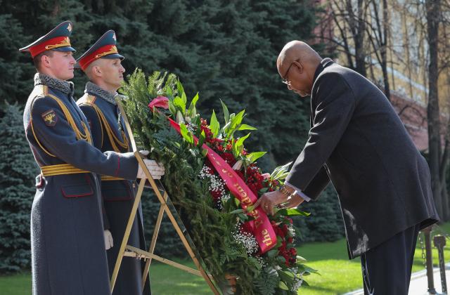 Seychelles' President Patrick Herminie attends a wreath-laying ceremony at the Tomb of the Unknown Soldier near the Kremlin wall in Moscow on April 22, 2026. (Photo by MAXIM SHIPENKOV / POOL / AFP)