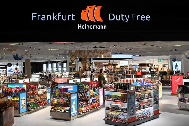 General view of a Heineman duty free shop inside the new Terminal 3 of Frankfurt's international airport on the day of its official inauguration on April 22, 2026 in Frankfurt, western Germany. (Photo by Kirill KUDRYAVTSEV / AFP)
