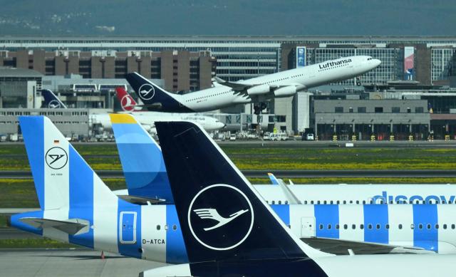 An aircraft of German airline Lufthansa takes the start at the Frankfurt International airport on the day of the official inauguration of new Terminal 3 on April 22, 2026 in Frankfurt, western Germany. (Photo by Kirill KUDRYAVTSEV / AFP)