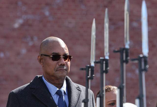 Seychelles' President Patrick Herminie attends a wreath-laying ceremony at the Tomb of the Unknown Soldier near the Kremlin wall in Moscow on April 22, 2026. (Photo by MAXIM SHIPENKOV / POOL / AFP)