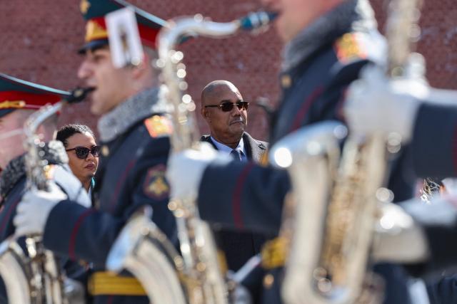 Seychelles' President Patrick Herminie attends a wreath-laying ceremony at the Tomb of the Unknown Soldier near the Kremlin wall in Moscow on April 22, 2026. (Photo by MAXIM SHIPENKOV / POOL / AFP)