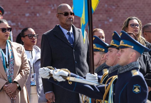 Seychelles' President Patrick Herminie attends a wreath-laying ceremony at the Tomb of the Unknown Soldier near the Kremlin wall in Moscow on April 22, 2026. (Photo by MAXIM SHIPENKOV / POOL / AFP)