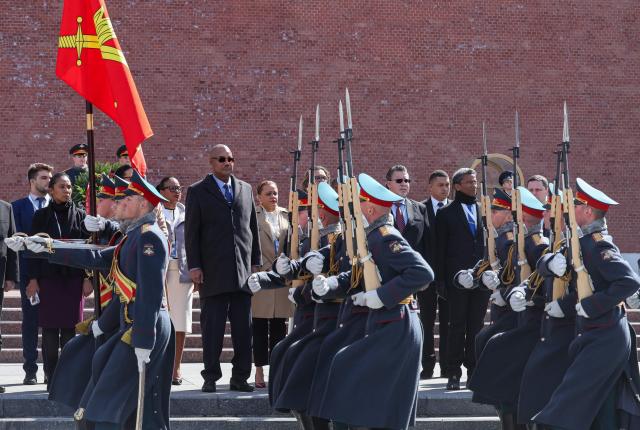 Seychelles' President Patrick Herminie attends a wreath-laying ceremony at the Tomb of the Unknown Soldier near the Kremlin wall in Moscow on April 22, 2026. (Photo by MAXIM SHIPENKOV / POOL / AFP)