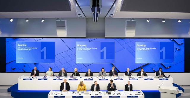 Dutch tech giant ASML's management and supervision members attend the firm general shareholders' meeting at its corporate headquarters in Veldhoven on April 22, 2026. ASML, which makes cutting-edge machines to manufacture semiconductor chips, said on April 15, 2026 that rapidly expanding AI-related investments had pushed up net profits as it also hiked its sales forecast for 2026. (Photo by Freek VAN DEN BERGH / ANP / AFP) / Netherlands OUT