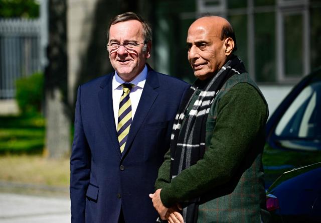 German Defence Minister Boris Pistorius (L) and his Indian counterpart Rajnath Singh pose ahead a welcoming ceremony at the Defence Ministry in Berlin, on April 22, 2026. (Photo by Tobias SCHWARZ / AFP)