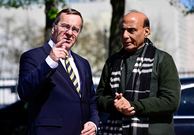 German Defence Minister Boris Pistorius (L) welcomes his Indian counterpart Rajnath Singh ahead a welcoming ceremony at the Defence Ministry in Berlin, on April 22, 2026. (Photo by Tobias SCHWARZ / AFP)
