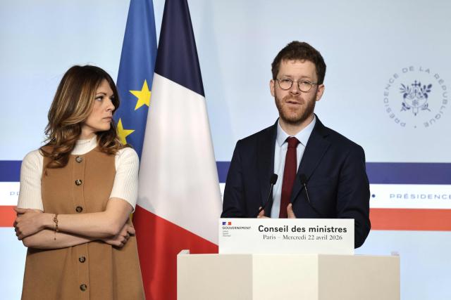 France’s junior Minister for Public Accounts David Amiel speaks next to France's Government Spokesperson and junior Minister for Energy and Digital economy Maud Bregeon during a press conference following the weekly cabinet meeting at the Elysee Presidential Palace in Paris on April 22, 2026. The weekly cabinet meeting was held in the central France city of Montluзon on April 22, 2026. (Photo by Ludovic MARIN / AFP)