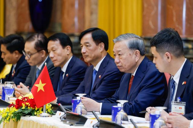 Vietnam's President To Lam (2nd R) meets with South Korean President Lee Jae Myung at the Presidential Palace in Hanoi on April 22, 2026. Vietnam's top leader To Lam, who became president in early April assuming a dual role as head of state and of the ruling Communist Party, hosted South Korean President Lee Jae Myung in Hanoi on April 22, a meeting that was expected to yield multiple cooperative agreements. (Photo by LUONG THAI LINH / POOL / AFP)