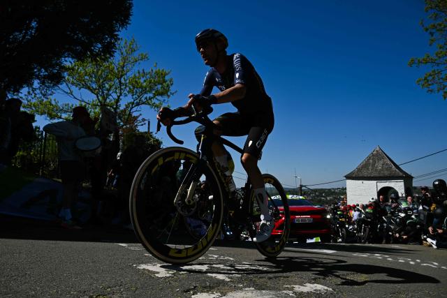 Pinarello-Q36.5 Pro Cycling Team's Dutch Sjoerd Bax rides the "Mur de Huy" (Wall of Huy) during 'La Fleche Wallonne' one day cycling race, 200 km from Herstal to Huy, on April 22, 2026. (Photo by JOHN THYS / AFP)