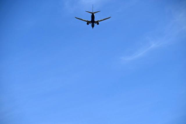 A RyanAir passenger aircraft prepares to land at Liverpool John Lennon Airport in Liverpool, north west England on April 22, 2026. The EU unveiled on April 22 plans to address the energy crisis triggered by the war in the Middle East, including improved monitoring of jet fuel supplies as the prospect of shortages rattles Europe ahead of the summer travel season. (Photo by Paul ELLIS / AFP)