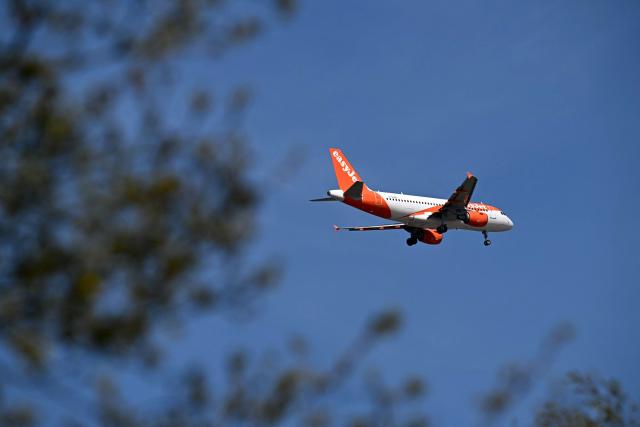 An EasyJet passenger aircraft prepares to land at Liverpool John Lennon Airport in Liverpool, north west England on April 22, 2026. The EU unveiled on April 22 plans to address the energy crisis triggered by the war in the Middle East, including improved monitoring of jet fuel supplies as the prospect of shortages rattles Europe ahead of the summer travel season. (Photo by Paul ELLIS / AFP)