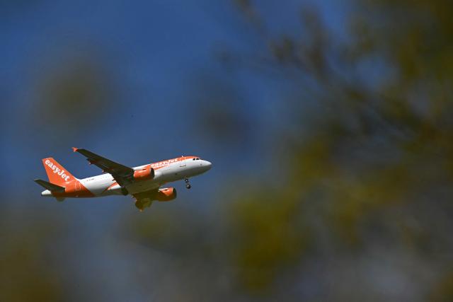 An EasyJet passenger aircraft prepares to land at Liverpool John Lennon Airport in Liverpool, north west England on April 22, 2026. The EU unveiled on April 22 plans to address the energy crisis triggered by the war in the Middle East, including improved monitoring of jet fuel supplies as the prospect of shortages rattles Europe ahead of the summer travel season. (Photo by Paul ELLIS / AFP)