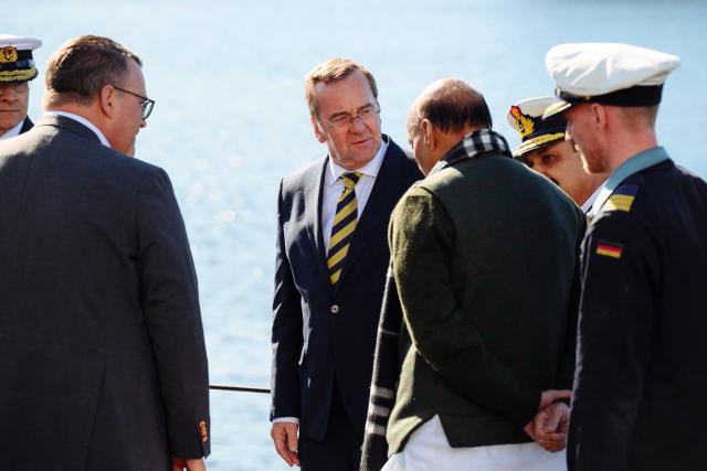 German Defence Minister Boris Pistorius (C) and Indian Defence Minister Rajnath Singh (3rd R) visit the TKMS (ThyssenKrupp Marine Systems) submarine shipyard, in Kiel, northern Germany on April 22, 2026. (Photo by Gregor Fischer / AFP)
