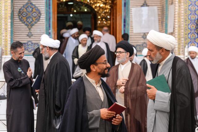 Shia clerics gather inside the Imam Ali Shrine in the Old City of Najaf on April 22, 2026. The International Monetary Fund sharply reduced its 2026 growth forecast for the Middle East and North Africa to 1.1 percent on April 14, as war chokes Gulf oil and gas exports. Iran, Iraq and Qatar will be particularly hard-hit, the IMF's World Economic Outlook warned, with Iraq’s economy projected to contract by 6.8 percent. (Photo by Qassem al-KAABI / AFP)