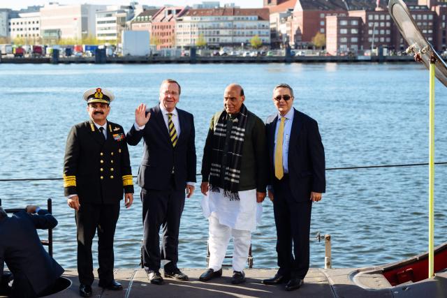 German Defence Minister Boris Pistorius (2nd L) and Indian Defence Minister Rajnath Singh (2nd R) pose for a photo on a U-34  submarine as they visit the TKMS (ThyssenKrupp Marine Systems) submarine shipyard, in Kiel, northern Germany on April 22, 2026. (Photo by Gregor Fischer / AFP)