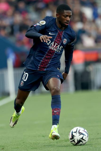 Paris Saint-Germain's French forward #10 Ousmane Dembele runs with the ball during the French L1 football match between Paris Saint-Germain (PSG) and FC Nantes at the Parc des Princes stadium in Paris on April 22, 2026. (Photo by FRANCK FIFE / AFP)