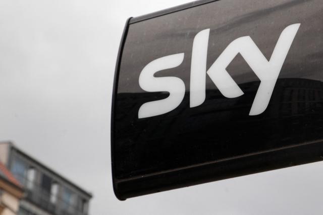 (FILES) The logo of Sky, a German TV company, is seen on the terrace of a restaurant in front of an appartment building in Berlin on June 27, 2025. RTL has been given the green light to acquire the German pay-TV broadcaster Sky. The European Commission in Brussels gave its approval on April 22, 2026 for the takeover of Sky's German-language services. The Luxembourg-based RTL Group announced the purchase last June. (Photo by Lilas TANTUSSI DEVOS / AFP)