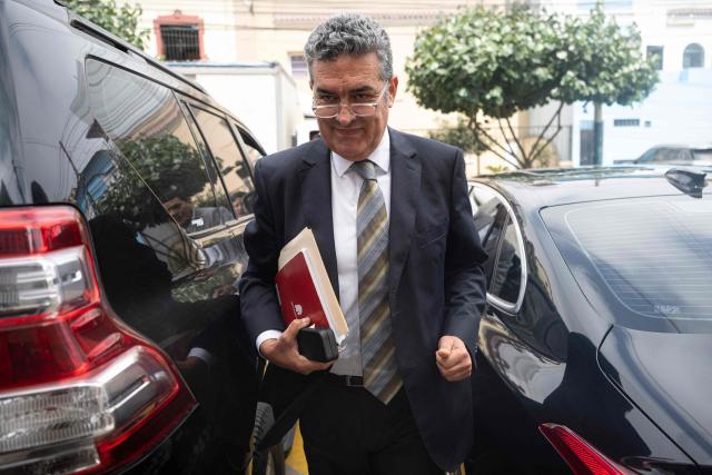 The new interim head of Peru's National Office of Electoral Processes (ONPE), Bernardo Pachas, arrives at the National Jury of Elections (JNE) headquarters in Lima on April 22, 2026. (Photo by Ernesto BENAVIDES / AFP)