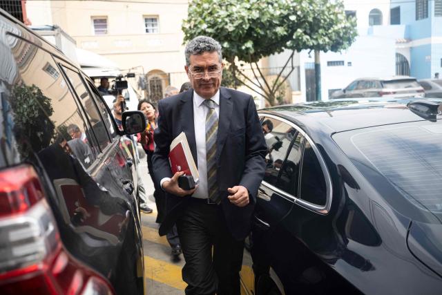 The new interim head of Peru's National Office of Electoral Processes (ONPE), Bernardo Pachas, arrives at the National Jury of Elections (JNE) headquarters in Lima on April 22, 2026. (Photo by Ernesto BENAVIDES / AFP)